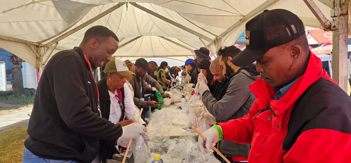 Vodacom volunteers making eco-bricks